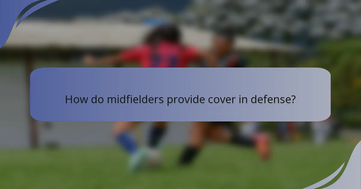 How do midfielders provide cover in defense?